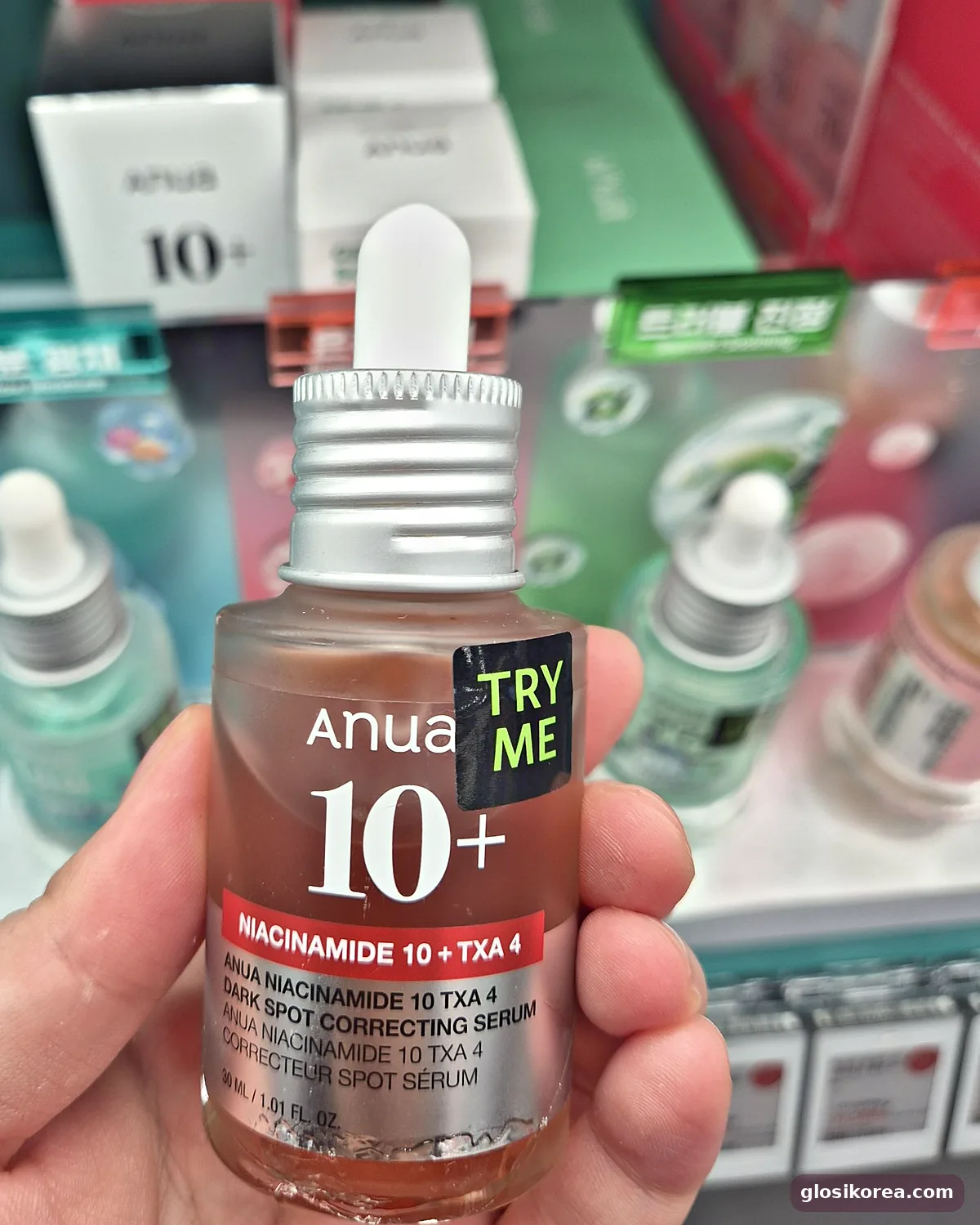 Anua Niacinamide 10 + TXA 4 Dark Spot Correcting Serum tester held in hand