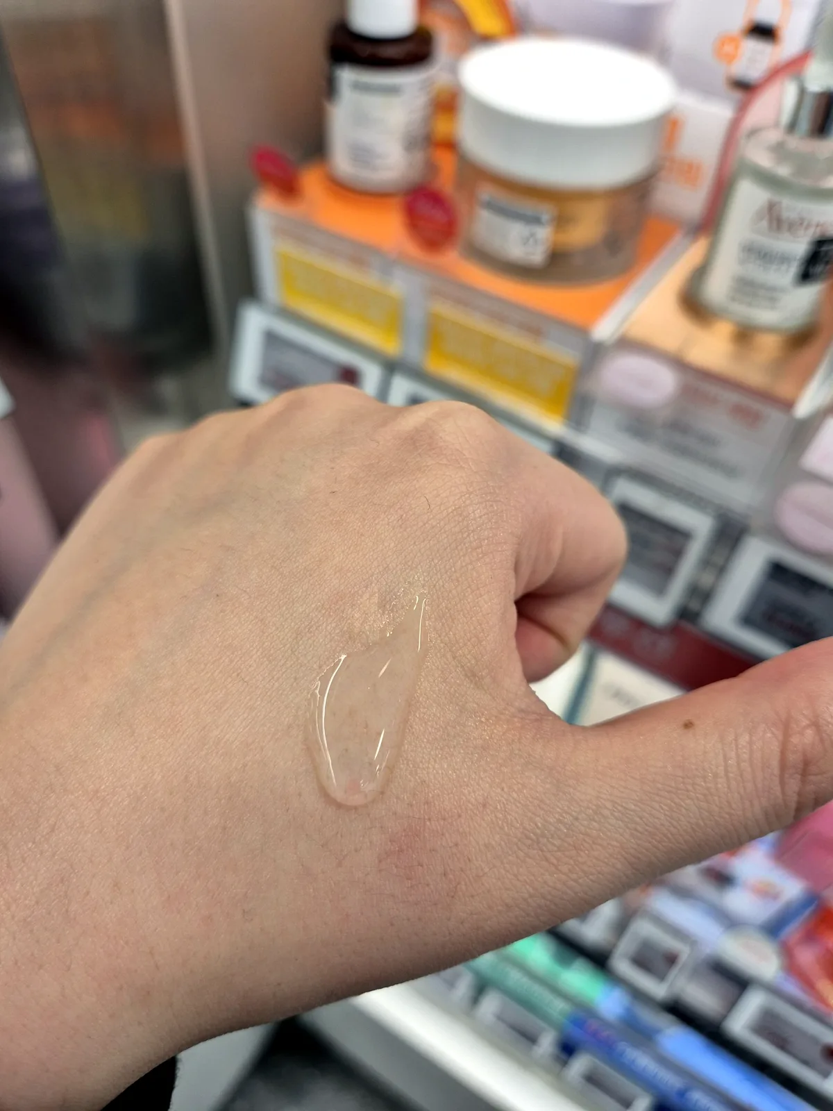 Avene Hyaluron Activ B3 serum swatch on hand, clear thin gel