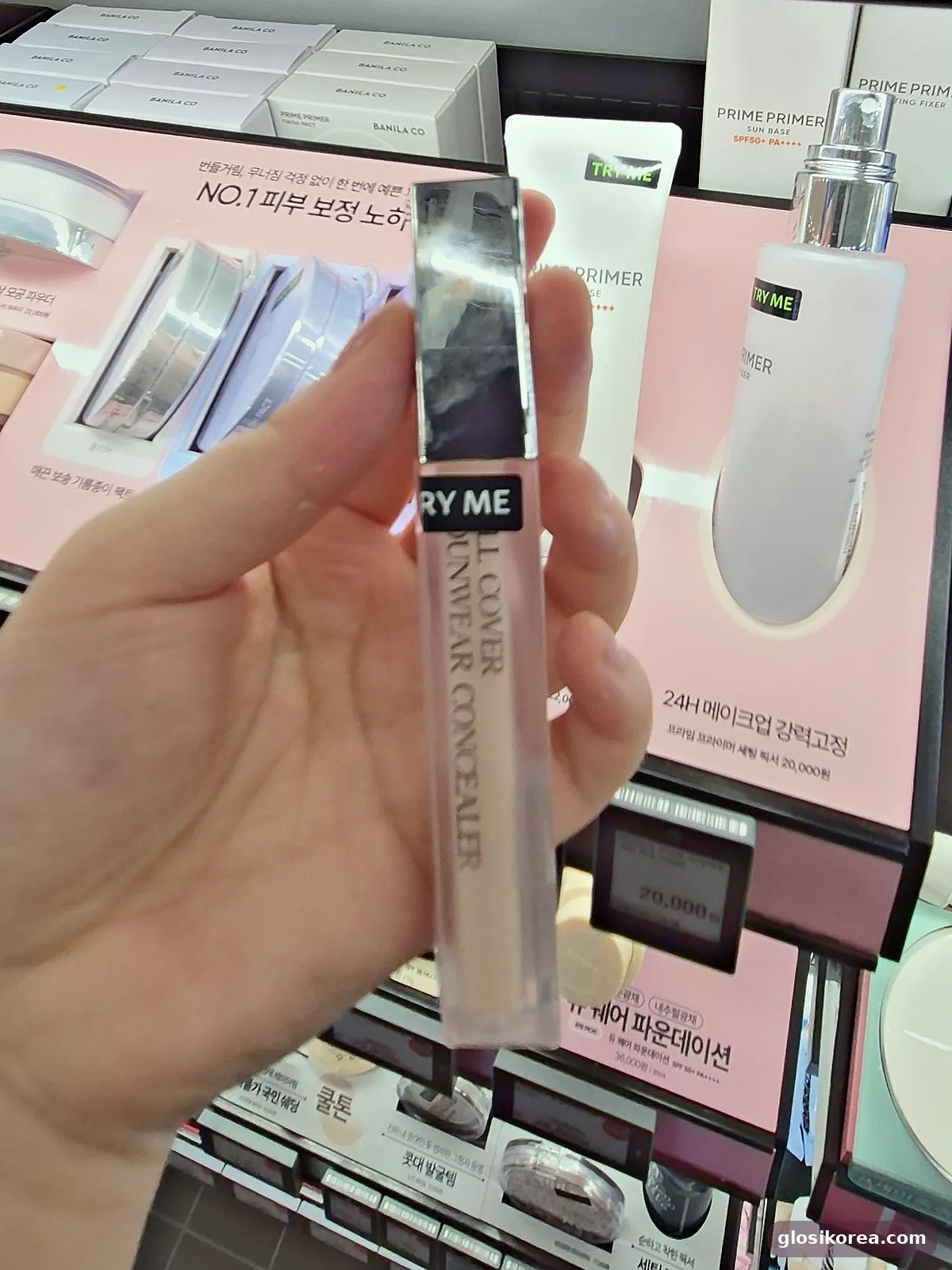 CLIO Kill Cover Founwear Concealer tester held in hand at Olive Young