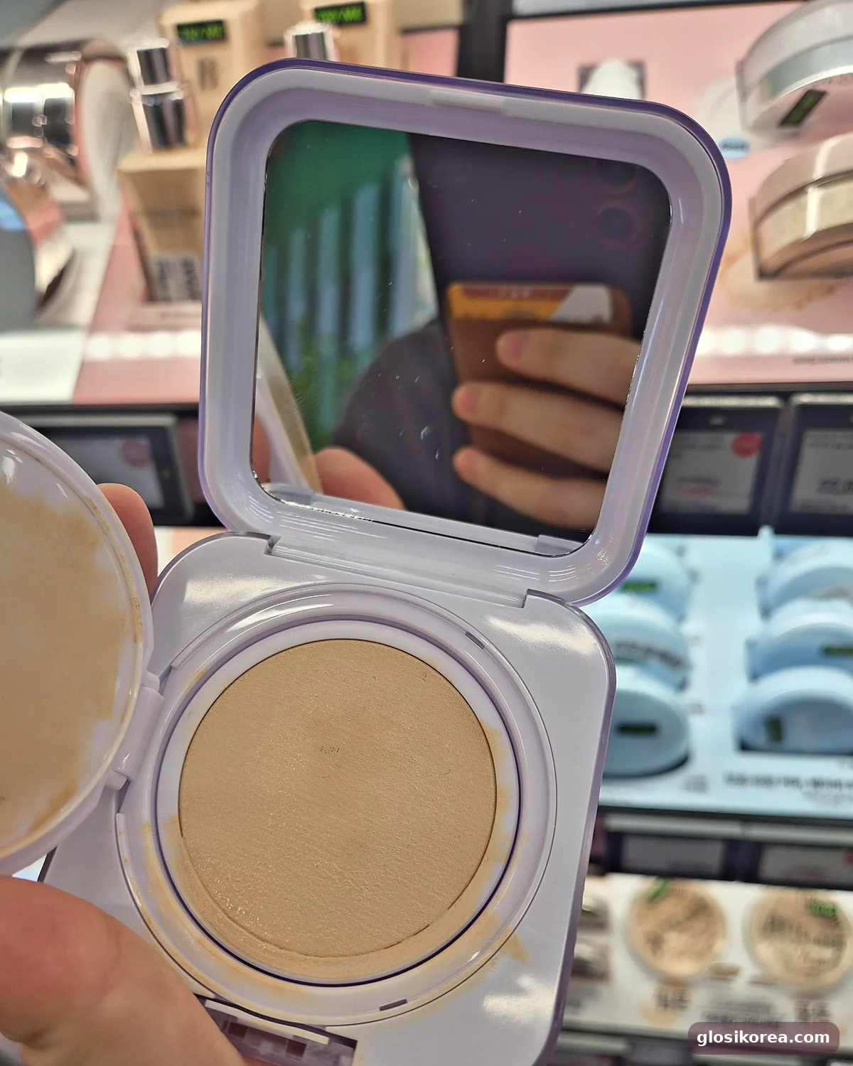 CLIO Kill Cover Mesh Blur Cushion tester opened in hand at Olive Young