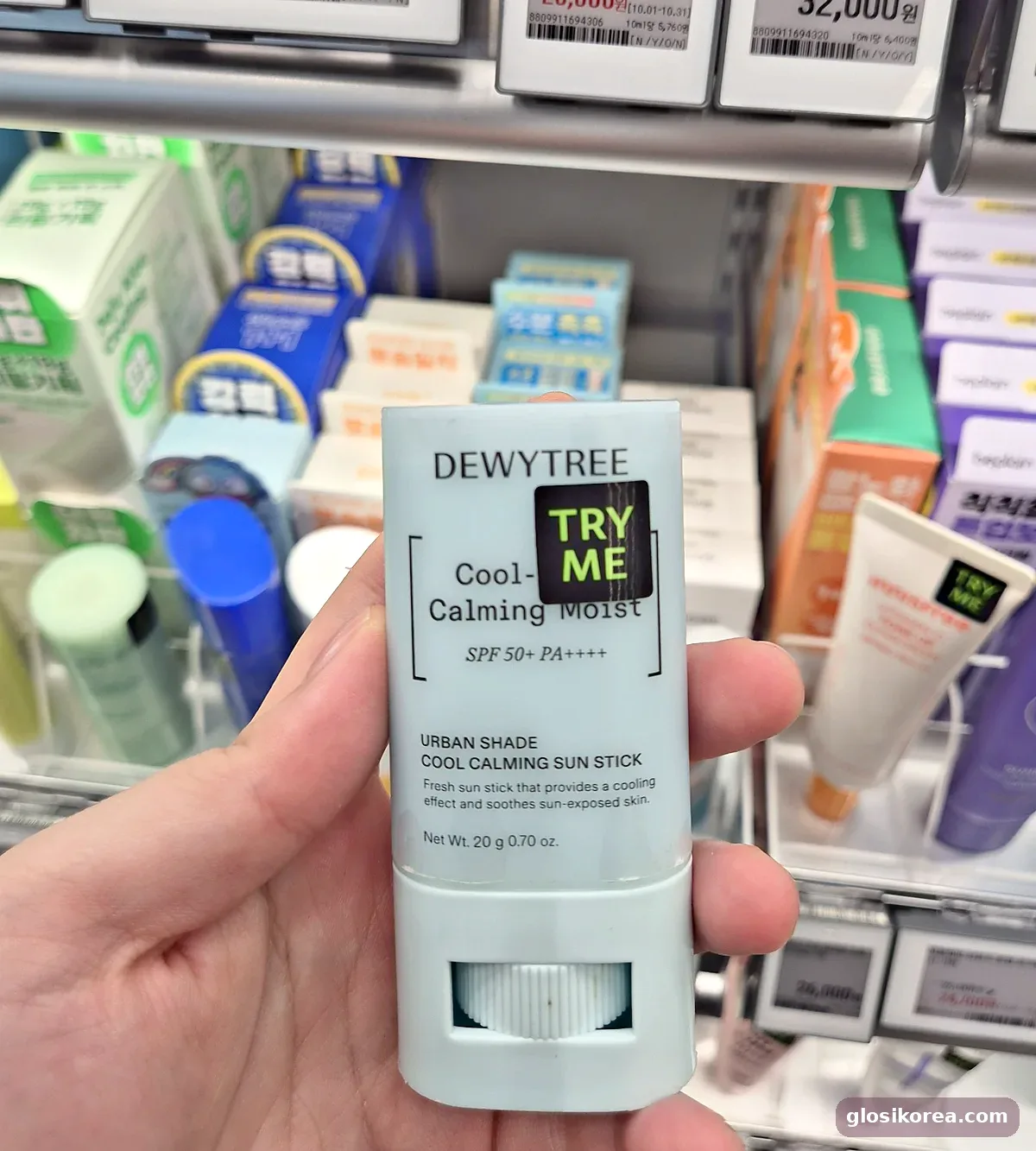 Dewytree Urban Shade Cool Calming Sun Stick held in hand