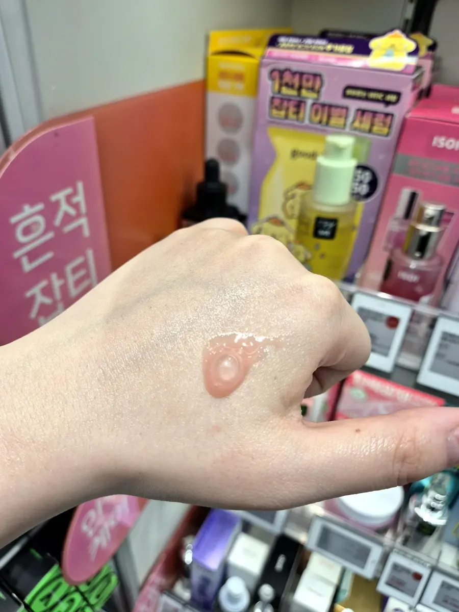 medicube PDRN Pink Peptide Serum swatch, pink jelly texture