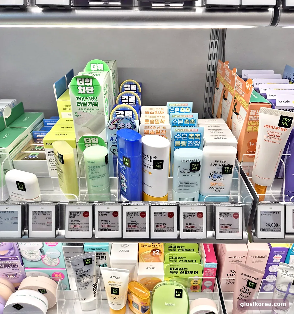 Sun stick shelf with price tags at Olive Young in Seoul