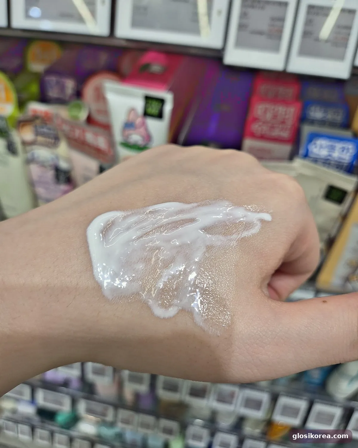 Beauty of Joseon Relief Sun Rice + Probiotics texture swatch on the back of a hand