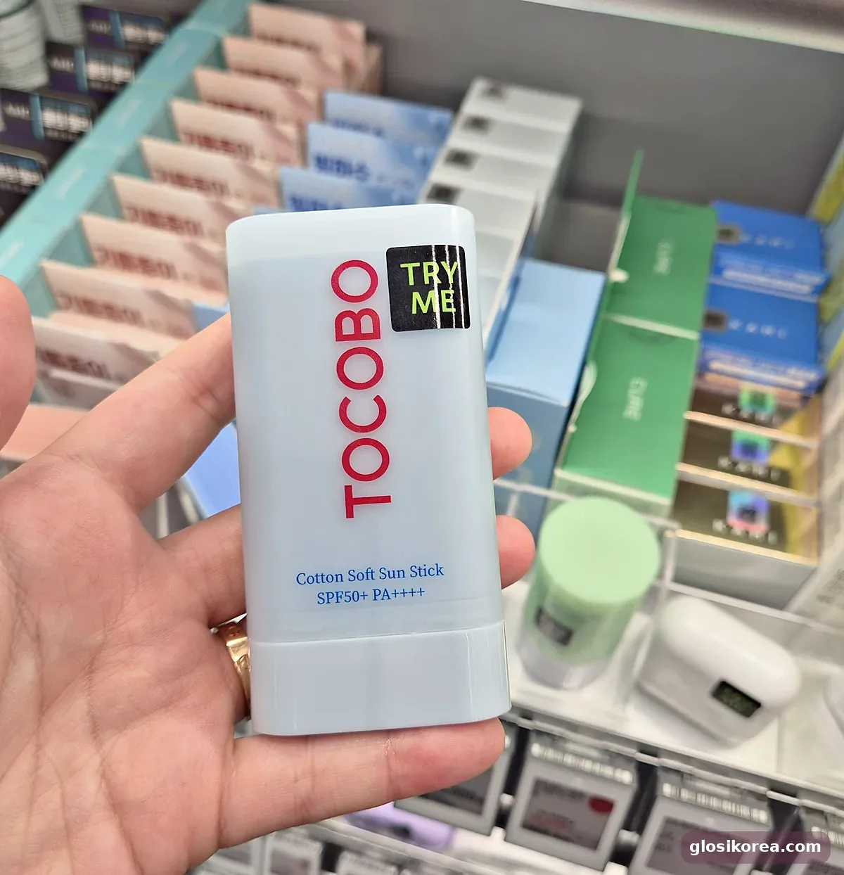 TOCOBO Cotton Soft Sun Stick SPF50+ held in hand at Olive Young